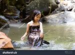 Стоковая фотография 471547460: Little Girl Taking Bath River